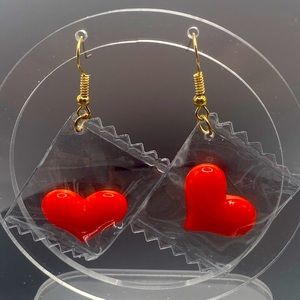 Gold tone clear plastic envelope heart earrings